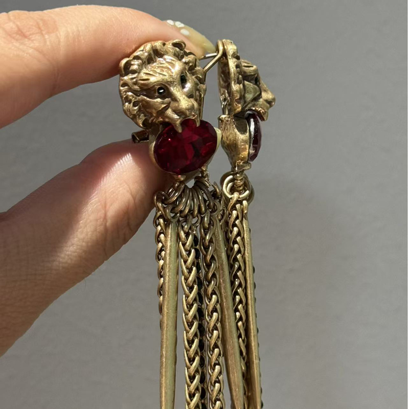 Vintage Fashion Jewelry Brands - Boucles d'oreilles longues vintage tête de