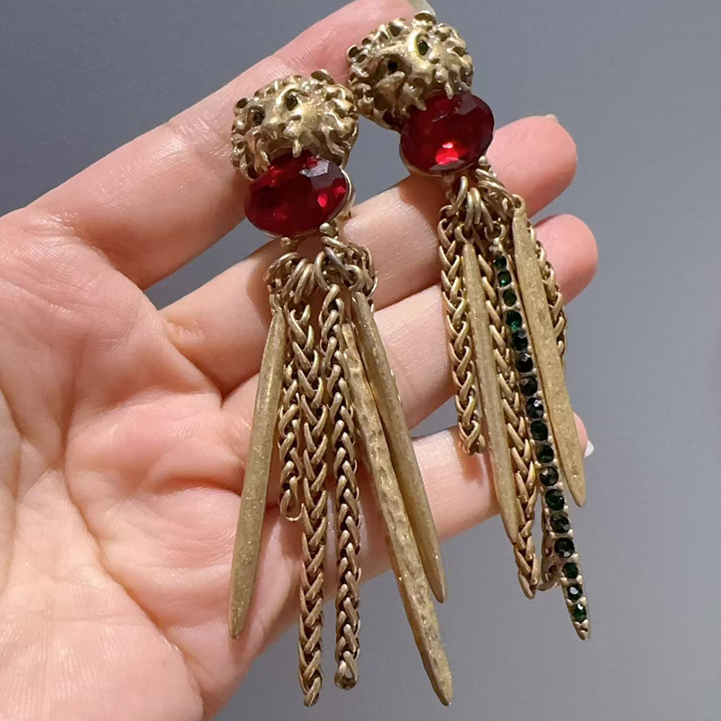 Boucles d'oreilles longues vin - Vintage Fashion Jewelry Brands avis et prix